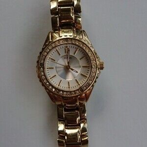 Guess Analog gold tone with rhinestones Watch